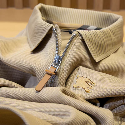 Embellished with a distinctive golden rabbit emblem on the chest