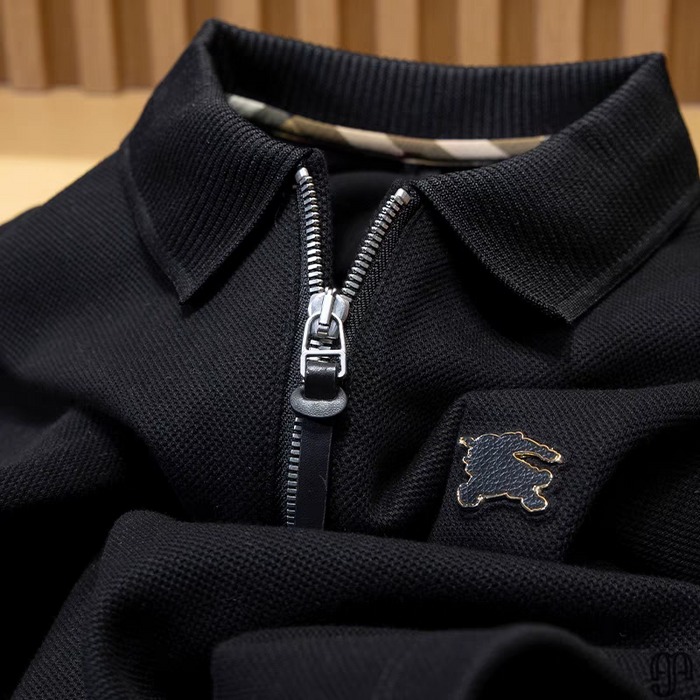 Embellished with a distinctive golden rabbit emblem on the chest