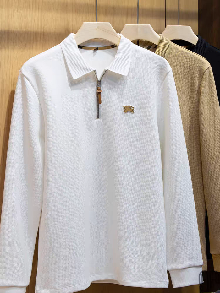 Embellished with a distinctive golden rabbit emblem on the chest