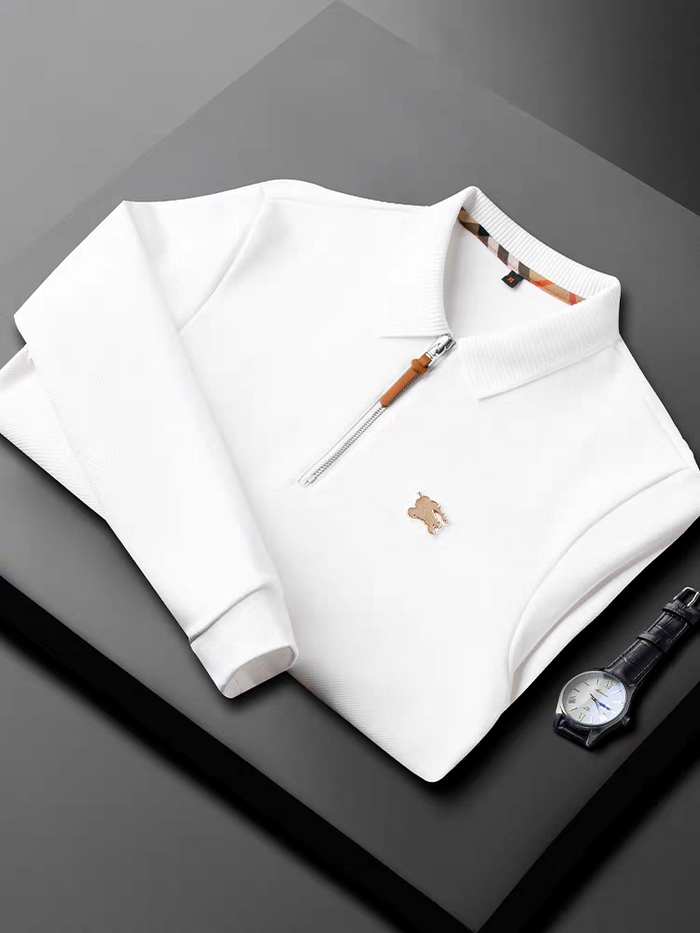 Embellished with a distinctive golden rabbit emblem on the chest
